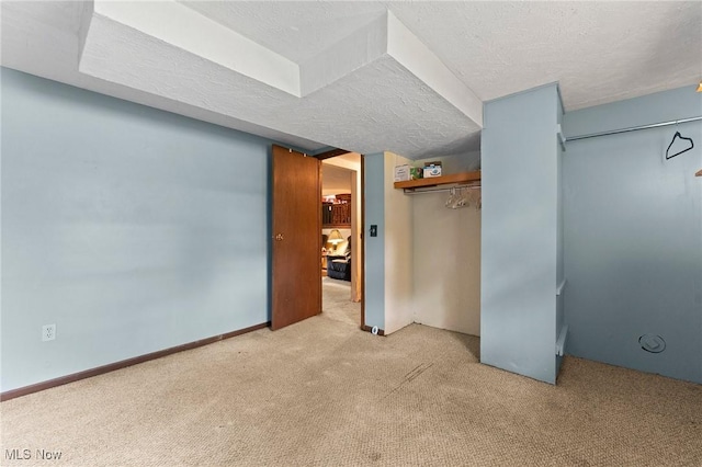 1781 Old Forge Rd, Mogadore, OH 44260 - unfurnished bedroom featuring carpet, a textured ceiling, and a closet