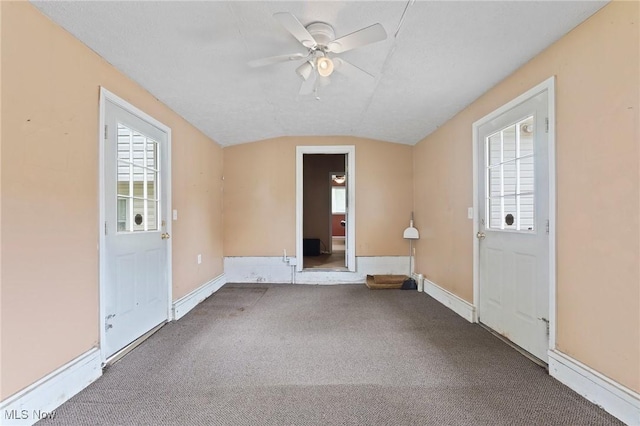 1781 Old Forge Rd, Mogadore, OH 44260 - spare room with a ceiling fan, healthy amount of natural light, lofted ceiling, and carpet flooring