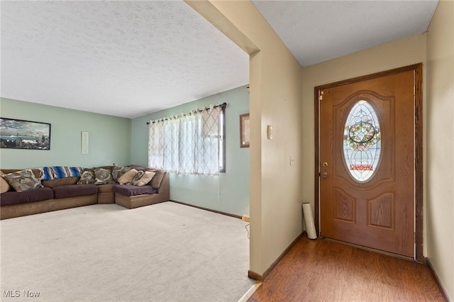 1781 Old Forge Rd, Mogadore, OH 44260 - foyer entrance with wood finished floors and a textured ceiling