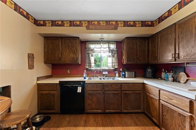 1781 Old Forge Rd, Mogadore, OH 44260 - kitchen featuring black dishwasher, light countertops, dark wood-style flooring, and a textured ceiling