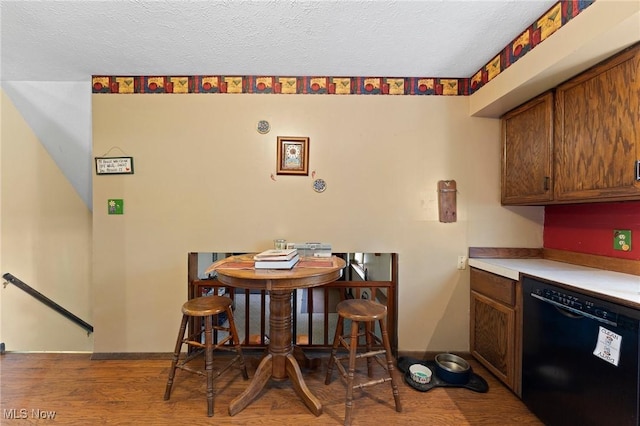 1781 Old Forge Rd, Mogadore, OH 44260 - dining room featuring wood finished floors and a textured ceiling