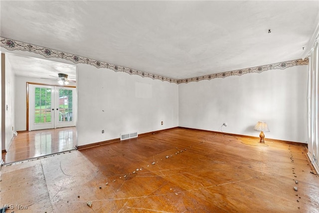 4524 Sherer Ave SW, Canton, OH 44706 - unfurnished room with baseboards and a ceiling fan