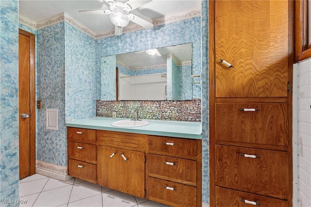 4524 Sherer Ave SW, Canton, OH 44706 - bathroom featuring vanity, tile patterned floors, ceiling fan, and wallpapered walls