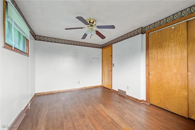 4524 Sherer Ave SW, Canton, OH 44706 - empty room featuring wood finished floors and a ceiling fan