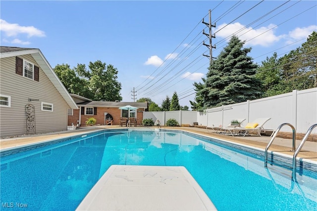2615 Daffodil St NE, Canton, OH 44705 - view of swimming pool featuring a fenced backyard