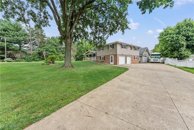 2615 Daffodil St NE, Canton, OH 44705 - view of front of home with concrete driveway, brick siding, and a garage