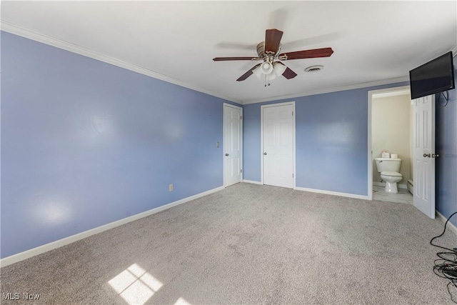 2615 Daffodil St NE, Canton, OH 44705 - unfurnished bedroom with ornamental molding, carpet, ensuite bath, and ceiling fan