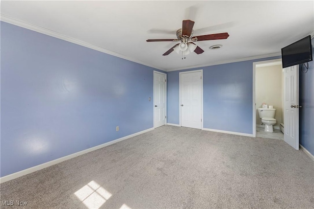 2615 Daffodil St NE, Canton, OH 44705 - unfurnished bedroom with ornamental molding, carpet, a ceiling fan, and ensuite bath
