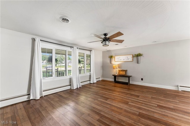 2615 Daffodil St NE, Canton, OH 44705 - unfurnished room featuring ceiling fan, hardwood / wood-style floors, and baseboard heating
