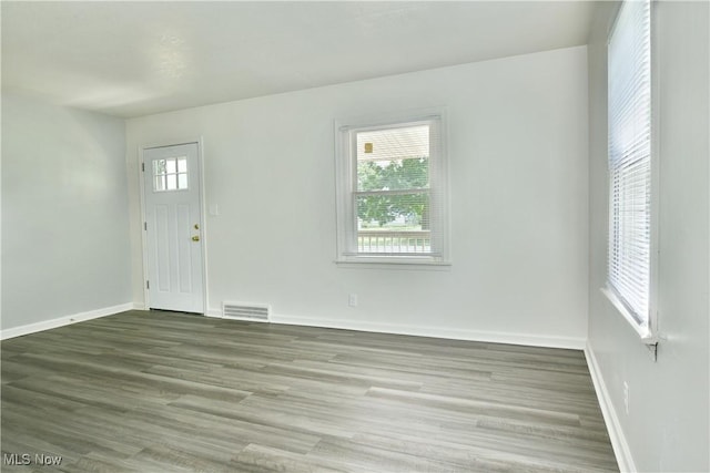 1006 Trumbull Ave, Warren, OH 44420 - foyer entrance with baseboards and wood finished floors