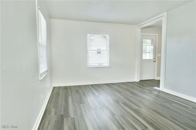 1006 Trumbull Ave, Warren, OH 44420 - spare room featuring wood finished floors