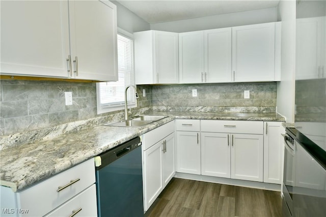 1006 Trumbull Ave, Warren, OH 44420 - kitchen with dishwashing machine, white cabinets, and dark wood finished floors
