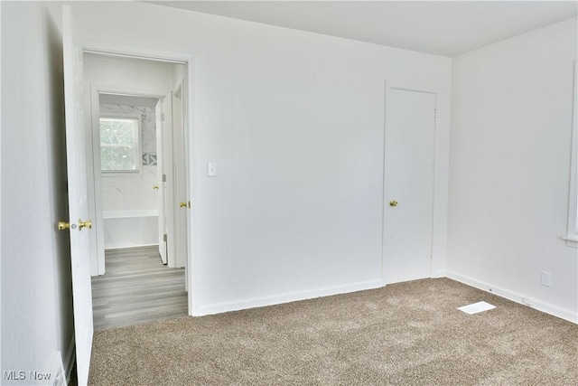 1006 Trumbull Ave, Warren, OH 44420 - spare room with carpet and baseboards