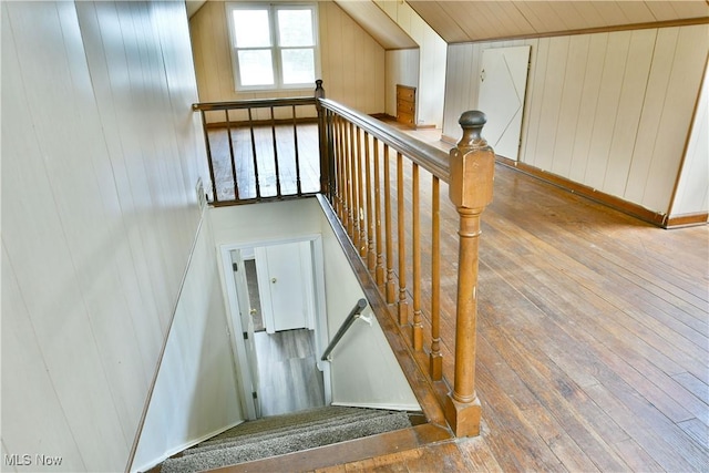 1006 Trumbull Ave, Warren, OH 44420 - stairway with hardwood / wood-style floors and wooden walls