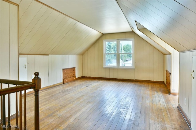 1006 Trumbull Ave, Warren, OH 44420 - additional living space with hardwood / wood-style flooring, lofted ceiling, and wooden walls