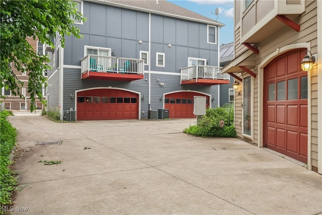 2395 Tremont Ave, Cleveland, OH 44113 - view of building exterior with concrete driveway and an attached garage