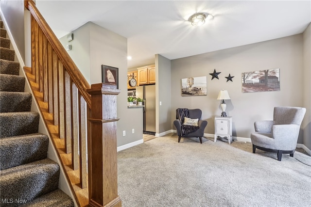 2395 Tremont Ave, Cleveland, OH 44113 - sitting room with light colored carpet, stairs, and recessed lighting