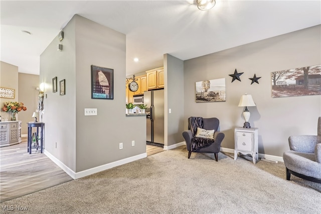 2395 Tremont Ave, Cleveland, OH 44113 - living area featuring light colored carpet and baseboards