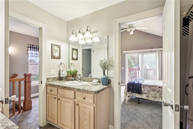2395 Tremont Ave, Cleveland, OH 44113 - ensuite bathroom featuring vanity, ceiling fan, and lofted ceiling