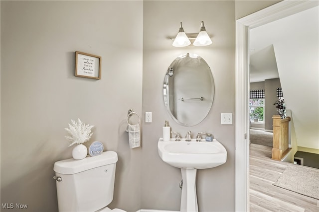 2395 Tremont Ave, Cleveland, OH 44113 - bathroom with toilet and wood finished floors