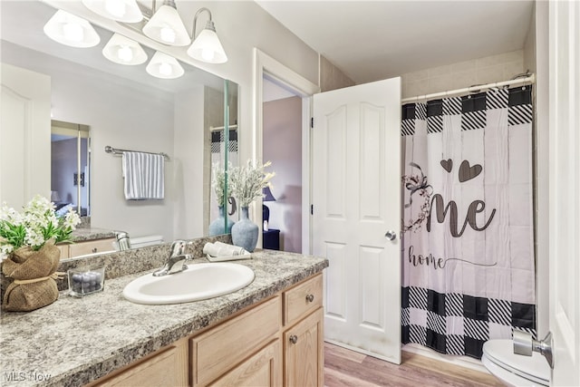 2395 Tremont Ave, Cleveland, OH 44113 - bathroom featuring vanity, wood finished floors, and a shower with shower curtain