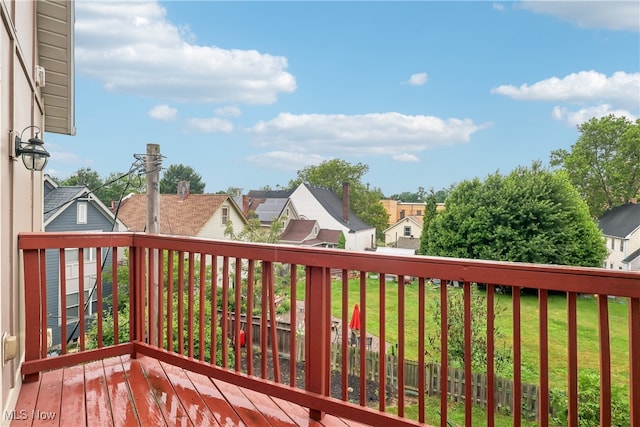 2395 Tremont Ave, Cleveland, OH 44113 - wooden deck featuring a residential view and a lawn