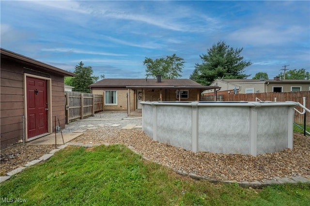 1291 Woodhurst Dr, Austintown, OH 44515 - back of property featuring a fenced backyard