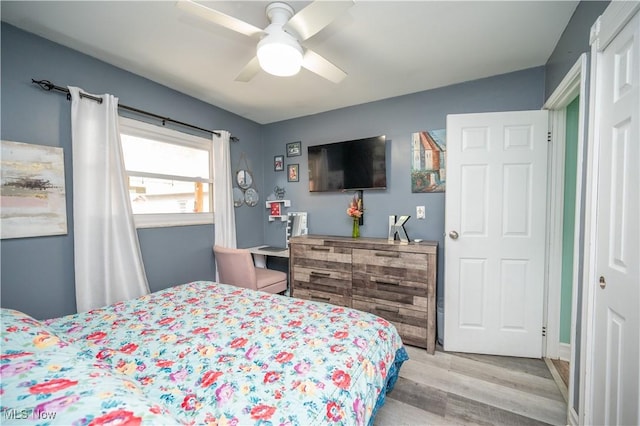 1291 Woodhurst Dr, Austintown, OH 44515 - bedroom featuring light wood-style floors and ceiling fan