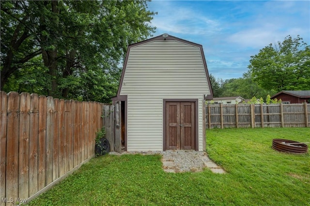 1291 Woodhurst Dr, Austintown, OH 44515 - view of shed with a fenced backyard