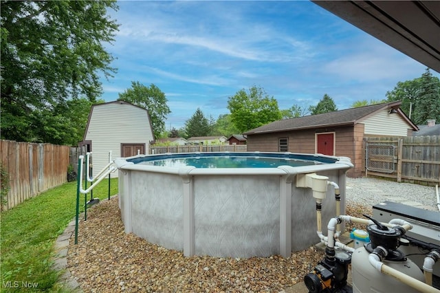 1291 Woodhurst Dr, Austintown, OH 44515 - view of pool featuring a fenced backyard and an outbuilding