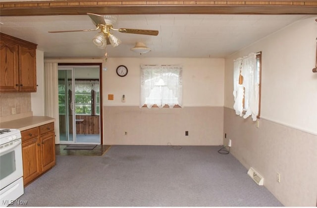51 N Navarre Ave, Youngstown, OH 44515 - kitchen featuring carpet flooring, brown cabinets, white electric range, and a ceiling fan