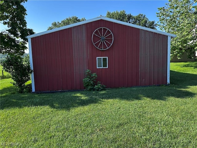 468 Carl St, Cumberland, OH 43732 - view of pole building with a lawn