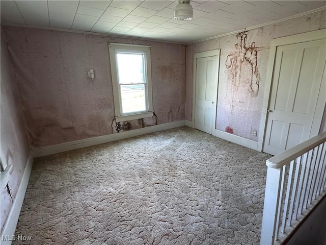 468 Carl St, Cumberland, OH 43732 - unfurnished bedroom with carpet and ornamental molding