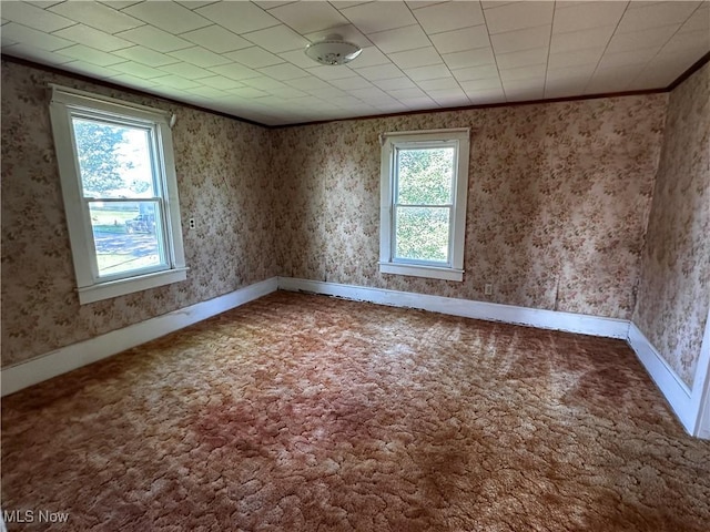 468 Carl St, Cumberland, OH 43732 - spare room with carpet, wallpapered walls, and ornamental molding