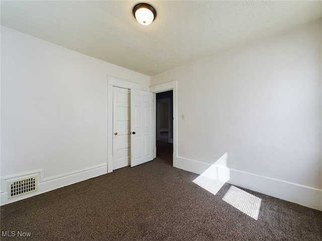 237 E Thornton St, Akron, OH 44311 - spare room with dark carpet