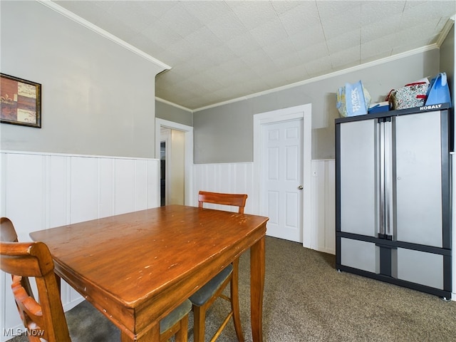 237 E Thornton St, Akron, OH 44311 - dining space featuring ornamental molding, carpet, and a wainscoted wall