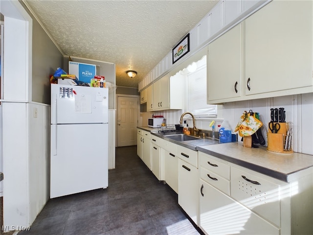 237 E Thornton St, Akron, OH 44311 - kitchen featuring white appliances, white cabinetry, and a textured ceiling