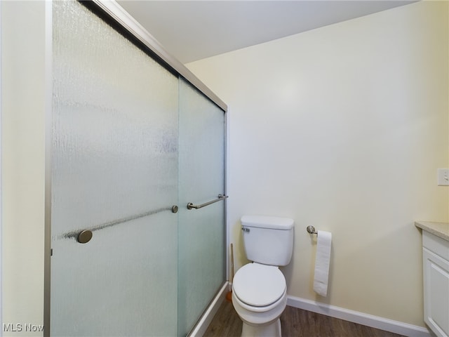 237 E Thornton St, Akron, OH 44311 - full bath with wood finished floors, vanity, and an enclosed shower