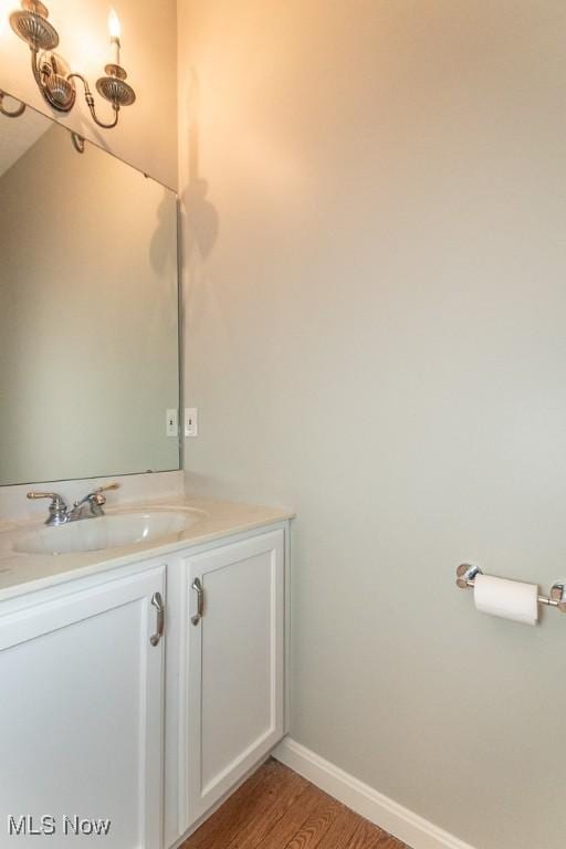 415 Cascade Ct, Avon Lake, OH 44012 - bathroom featuring vanity and wood finished floors