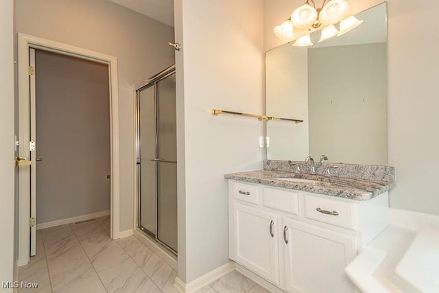 415 Cascade Ct, Avon Lake, OH 44012 - bathroom with marble finish flooring, a chandelier, vanity, and a shower stall