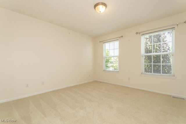 415 Cascade Ct, Avon Lake, OH 44012 - spare room with light colored carpet and baseboards