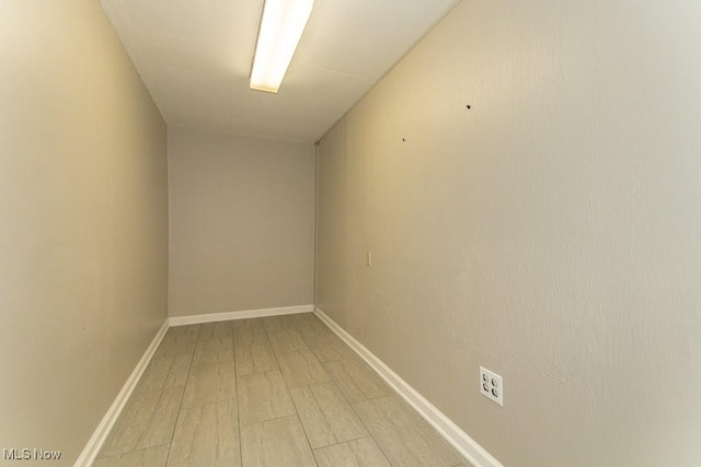 415 Cascade Ct, Avon Lake, OH 44012 - unfurnished room featuring light wood-style floors and baseboards