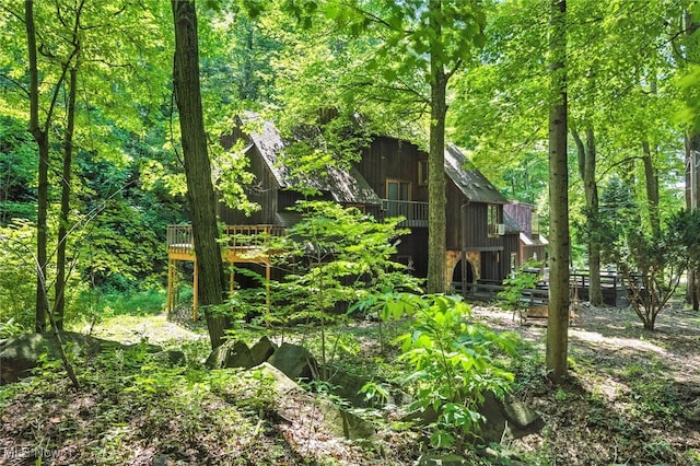 1915 Claus Rd, Vermilion, OH 44089 - view of yard with a forest view
