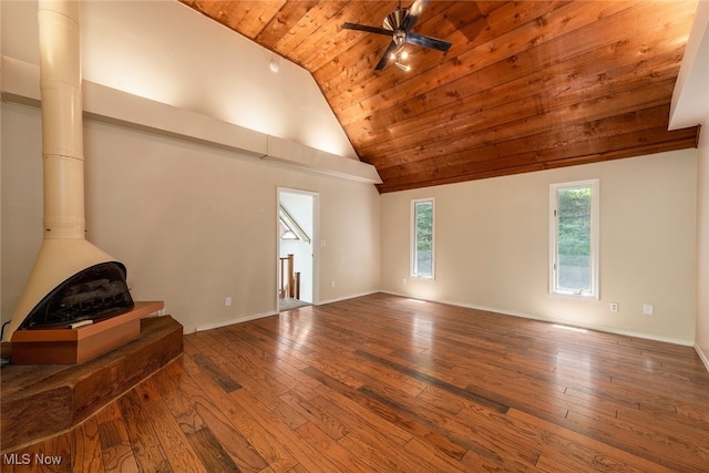 1915 Claus Rd, Vermilion, OH 44089 - unfurnished living room featuring wooden ceiling, a wood stove, hardwood / wood-style flooring, ceiling fan, and high vaulted ceiling