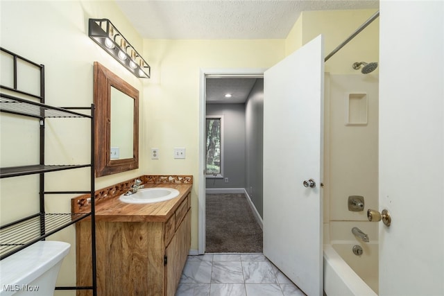 1915 Claus Rd, Vermilion, OH 44089 - full bath featuring marble look tiles, vanity, and bathtub / shower combination