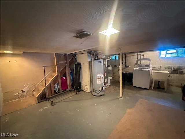 4926 E Wallings Rd, Broadview Heights, OH 44147 - basement featuring washer / clothes dryer and gas water heater