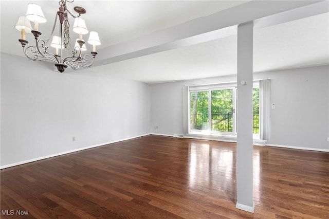 6480 State Rd Unit F7, Parma, OH 44134 - spare room with wood finished floors and a chandelier