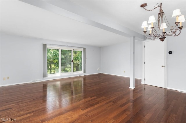 6480 State Rd Unit F7, Parma, OH 44134 - spare room featuring a chandelier and hardwood / wood-style floors