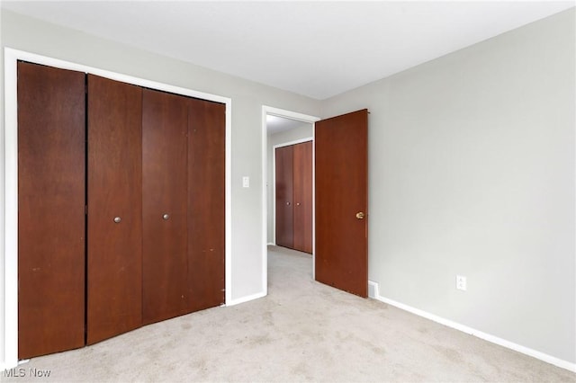 6480 State Rd Unit F7, Parma, OH 44134 - unfurnished bedroom featuring light colored carpet and a closet