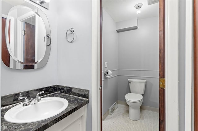 6480 State Rd Unit F7, Parma, OH 44134 - half bathroom featuring vanity and tile patterned flooring